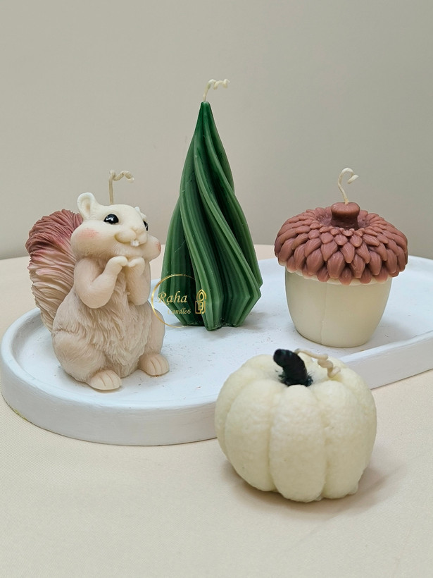 شمعهای فانتزی جنگلی شامل سنجاب، بلوط و کاج رها مال